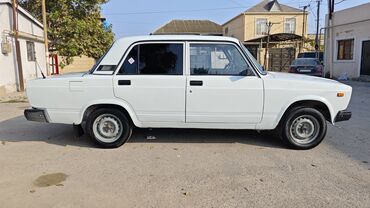 VAZ (LADA): Model: Lada 2107 Kuzov: sedan, ağ rəng Yanacaq: benzin Ötürmə — 13