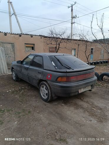 Mazda: Mazda 323: 1991 г., 1.6 л, Механика, Бензин, Хэтчбэк — 18