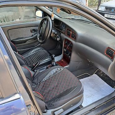 Kia: Kia Clarus: 2 l | 1997 il Sedan — 12