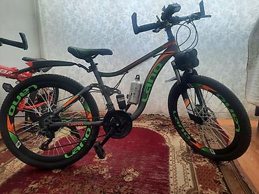 24 velosipedler: LANQ Pioneer dağ velosipedi 24 lük.320 m Almiṣam cox ucuz satiram . - — 1