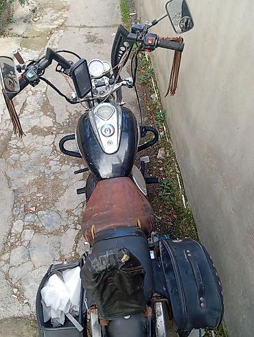 zarya: Kruizer tipli motosiklet Xüsusiyyətlər: - Tək silindrli benzin — 2