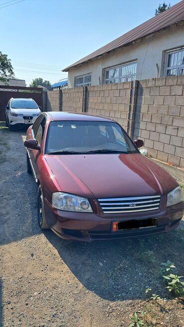машина с российскими номерами: Kia Opirus: 2002 г., 2.4 л, Механика, Бензин, Седан