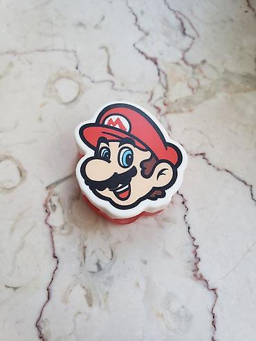 saqqız: Super Mario temalı kiçik konteyner/kapsul - Dizayn: Üst qapaqda Super — 1