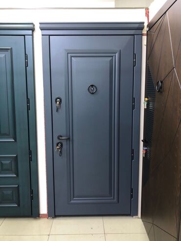 Giriş qapıları: Bu qapılar müasir dizaynı və davamlı materialları ilə seçilir. Evinizə — 8