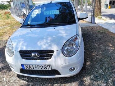 Transport: Kia Picanto: 1.1 l | 2010 year Hatchback