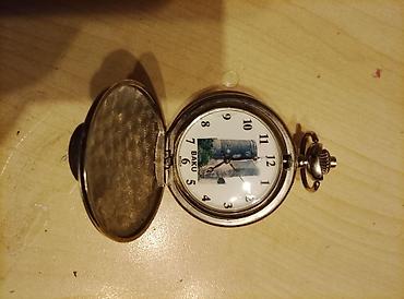часы casio: Cib saatı – “BAKU” tematikası- 9 reqemin yaninda susenin ustunde — 2