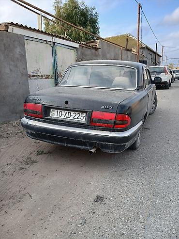 07 kardan: GAZ Volga 3110, sedan, qara rəng. evala salam xırda prablemleri var — 2