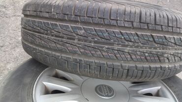 205 r15: Комплект из четырех автомобильных шин Timo H405 размером 205/65R15