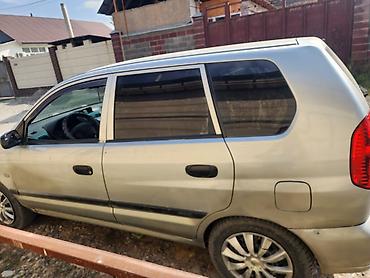 зад: Mitsubishi Space Star: 2003 г., 1.6 л, Механика, Бензин, Универсал — 3