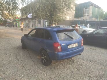 форд мазда: Mazda 323: 2003 г., 1.6 л, Механика, Бензин, Хэтчбэк