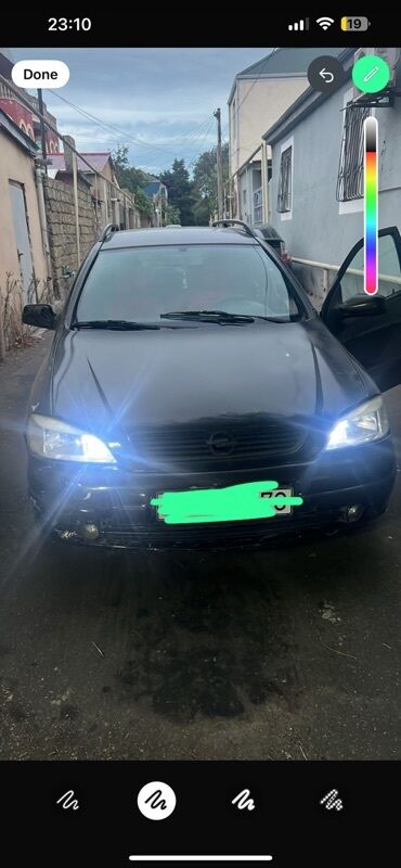 задняя фара в багажник ниссан примера р11: Opel Astra: 2 л |