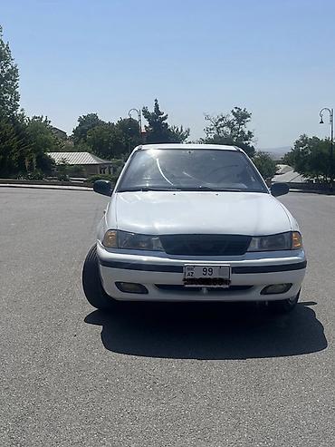 opel astra g opc: Ağ rəngli sedan, 4 qapılı, ön ötürücülü. Klassik, sadə dizaynlı kuzov — 1
