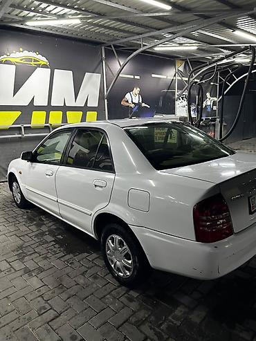 Mazda: Mazda Familia: 2002 г., 1.5 л, Автомат, Бензин — 3
