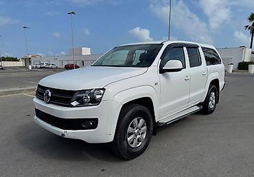 şevralit curuz: Volkswagen Amarok: 2 l | 2013 il Pikap — 1