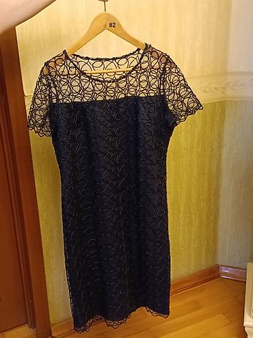 bas ortusu: Tünd lacivərt rəngdə zərif qadın donu. - Model: düz kəsimli, dizə — 2