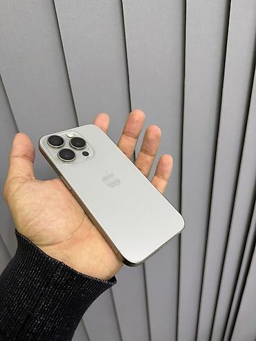 data modem: IPhone 15 Pro, 128 GB, Natural Titanium, Face ID — 1