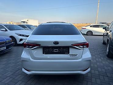 на 124: Toyota Corolla: 2020 г., 0.1 л, Автомат, Гибрид — 5