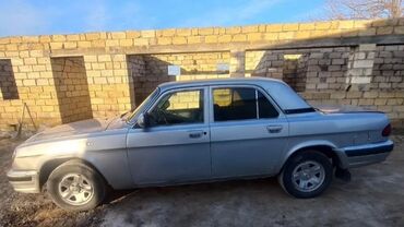 фольксваген поло замена: GAZ Volga 3110, gümüşü rəng, sedan gövdə. Texniki və xarici