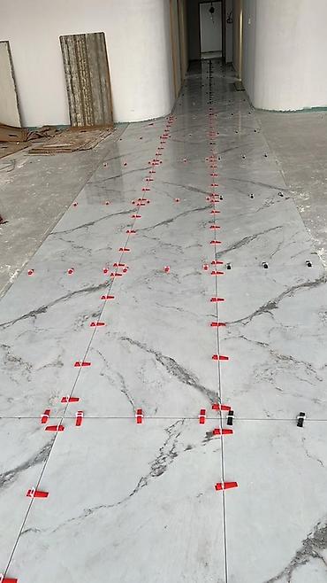 Plitə işləri: Peşəkar kafel və kermo­qranit ustasıyam. Şəkillərdə gördüyünüz işlər — 14