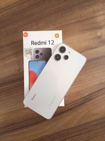 Xiaomi: Xiaomi Redmi 12, 128 GB, rəng - Gümüşü, 
 Zəmanət, Barmaq izi, İki sim kartlı