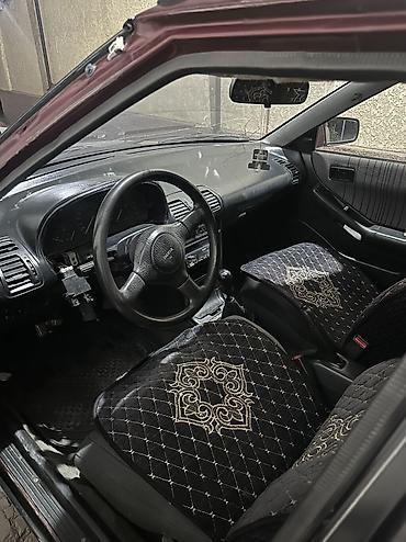 e38 bmw: Mazda 323: 1993 г., 1.6 л, Механика, Бензин, Хэтчбэк — 4