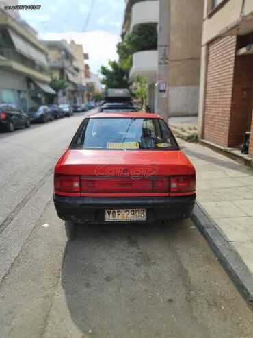 Οχήματα: Mazda 323: 1.3 l. | 1993 έ. Λιμουζίνα