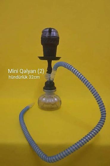 das sekilleri: ⚪Mini qəlyan (1) aparatı Hündürlük : 19 cm Qutu daxilində : ▫️Qəlyan — 4
