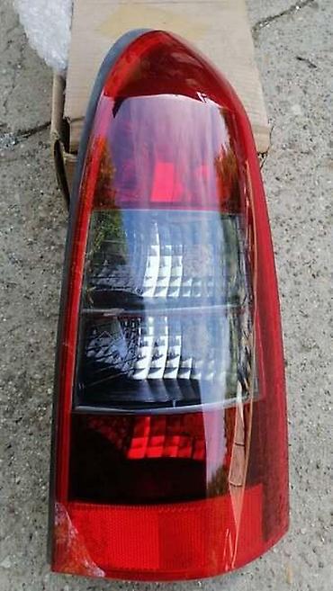bagi prodaja: DESNI STOP KARAVAN ZATAMNJENI ZA OPEL ASTRA G OD 1998. DO 2004. GOD — 1