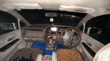 купить шевроле спарк автомат: Минивэн Honda Odyssey, представленный в серебристом цвете, предлагает