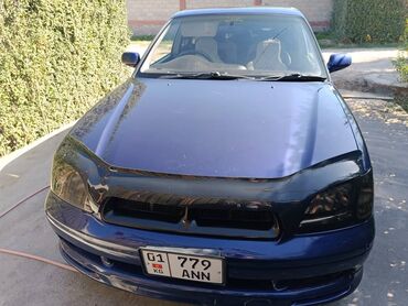 Другой тюнинг: Седан темно-синего цвета с аэродинамическим обвесом и заниженным — 3