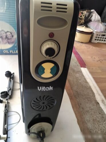 очень срочно нужно денег: Масляный обогреватель Vitek, Кол-во секций: 10 и более, Отключение при перегреве, Быстрый нагрев, Встроенный вентилятор