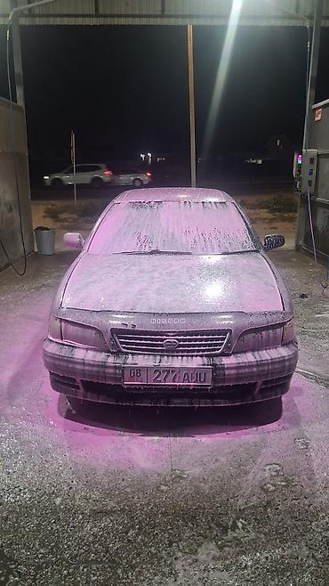 шины на карнивал: Nissan Sunny: 1998 г., Автомат, Бензин, Седан — 6