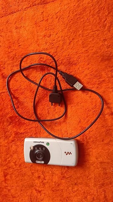 музык: Sony Ericsson W800i, Колдонулган, түсү - Ак, 1 SIM — 2