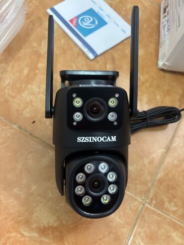 видеокамера panasonic профессиональная: Yeni, qutuda simsiz kameradır. İki kamera, biri sabit istiqamətdə