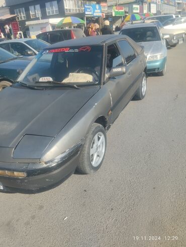 Mazda: Mazda 323: 1990 г., 1.6 л, Механика, Бензин, Хэтчбэк