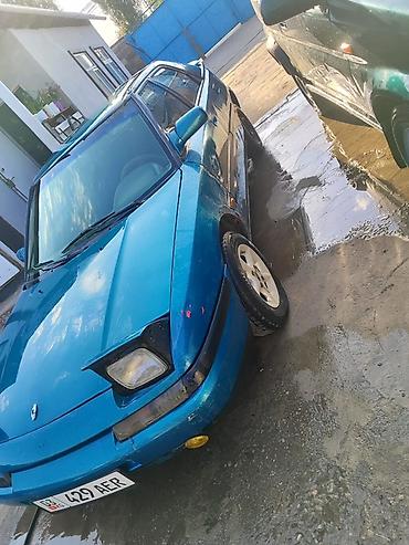 гитара 124: Mazda 323: 1992 г., Механика, Купе — 1