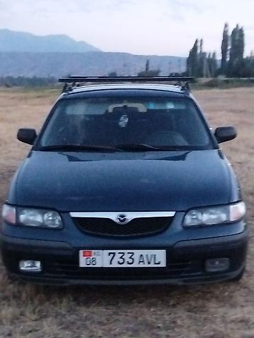 Mazda 626: 2003 г., Седан — 1