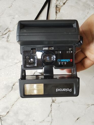 polaroid fotoaparat qiymeti: Normal vəziyyətdədi qırığı sınığı yoxdu bir az cızığı var