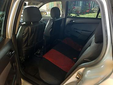 фольксваген тигуан л с: Opel Astra 1.3 turbo dizel (universal) – gümüşü rəngdə, 5 qapılı — 10