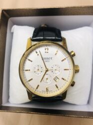 механические часы в баку: Saatlar ad Tissot qızılı rəng baha alınıb 70 azn. Ad Ameqa gümüşü rəng