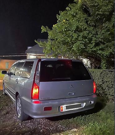 e klass: Mitsubishi Lancer: 2004 г., 1.6 л, Механика, Бензин, Универсал — 4