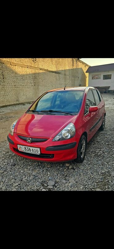 мотор тайота ипсум: Красный хэтчбек Honda Jazz, компактный и универсальный автомобиль