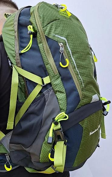 Sportske torbe i rančevi: Planinarski/trekking ranac Adventure 50L – maslinasto zeleni sa fluoro — 1