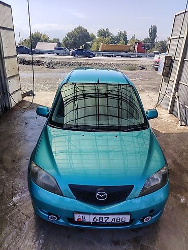 Mazda Demio: 2002 г., 1.5 л, Автомат, Бензин, Хэтчбэк