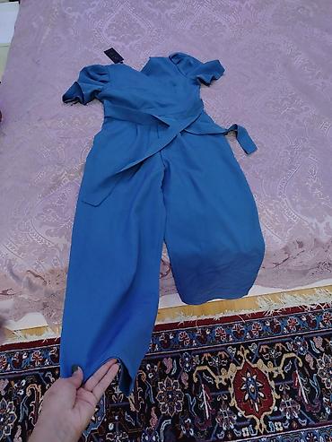 şalvar tulum: Mavi rəngli qadın kombinezonu.Yenidir etiketi uzerindedir.Razmeri — 1