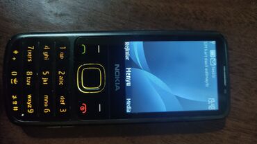 nokia 150: Nokia 6700 Slide, rəng - Qara, Düyməli