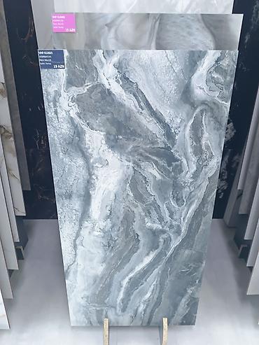 ev divar daslari: Kermoqranitlər. Kafel. Metlax.60x120 ölçüdə. Modellər çoxdur. Məhsul — 2