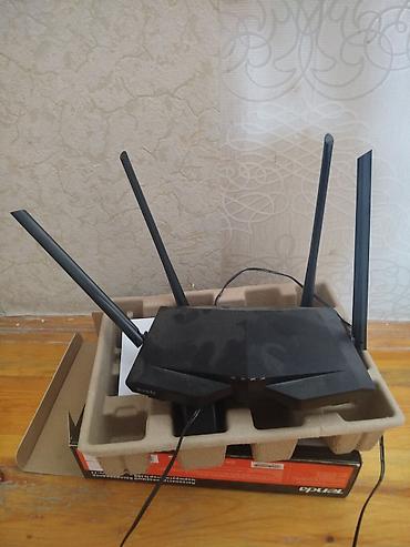 Tenda vifi modem satılır çox az istifade olunub köçlə bağlı təcili