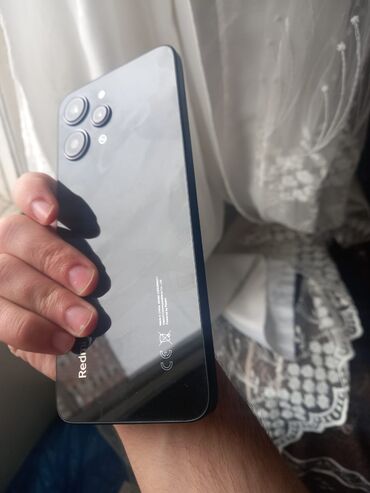 usb shnur: Xiaomi Redmi 12, 256 ГБ, цвет - Черный, 
 Сенсорный, Отпечаток пальца, Беспроводная зарядка