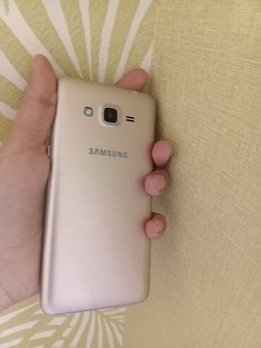 samsung j2: Samsung Galaxy J2 2016, 16 GB, rəng - Qızılı, İki sim kartlı
